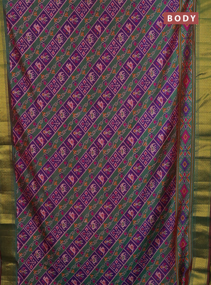 Semi tussar saree purple and green with allover patola prints and zari woven border