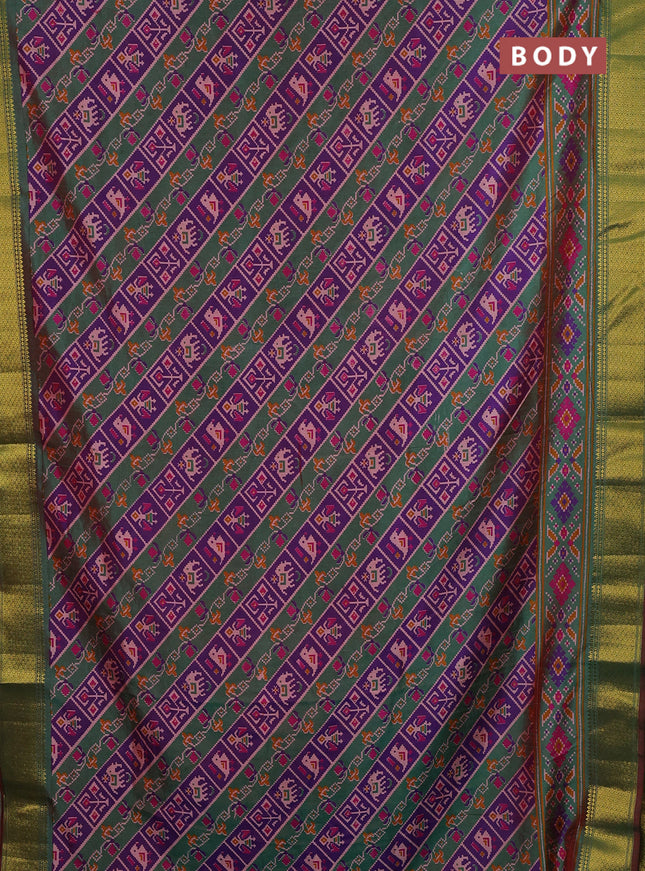 Semi tussar saree purple and green with allover patola prints and zari woven border