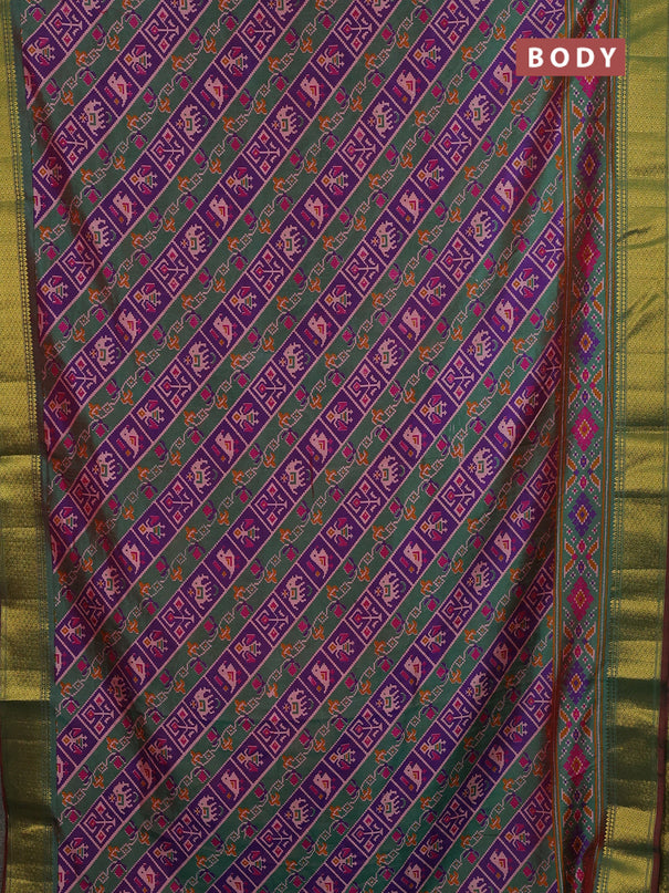 Semi tussar saree purple and green with allover patola prints and zari woven border