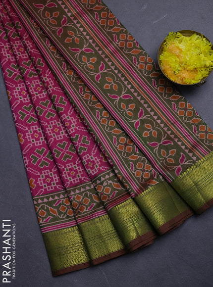 Semi tussar saree dual shade of pinkish orange and green with allover ikat prints and zari woven border