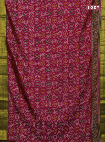 Semi tussar saree dual shade of pinkish orange and green with allover ikat prints and zari woven border
