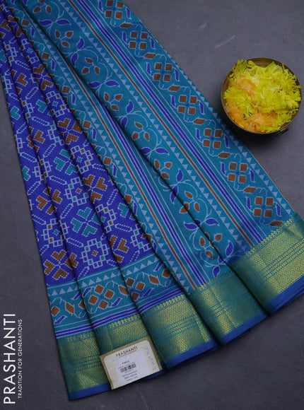 Semi tussar saree blue and teal green with allover ikat prints and zari woven border