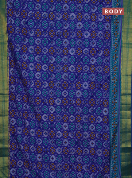 Semi tussar saree blue and teal green with allover ikat prints and zari woven border
