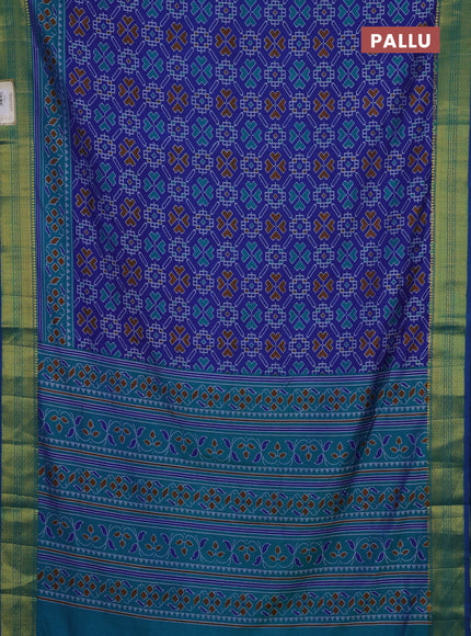 Semi tussar saree blue and teal green with allover ikat prints and zari woven border