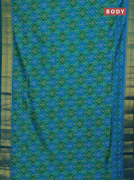 Semi tussar saree green and blue with allover ikat prints and zari woven border