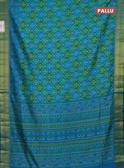 Semi tussar saree green and blue with allover ikat prints and zari woven border