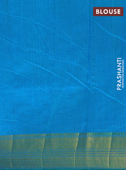 Semi tussar saree green and blue with allover ikat prints and zari woven border