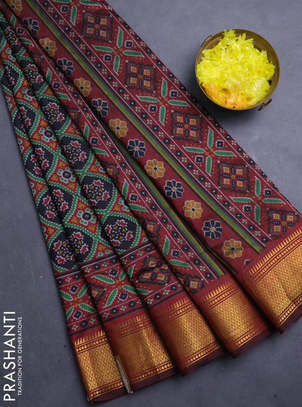Semi tussar saree black and deep maroon with allover ikat prints and zari woven border