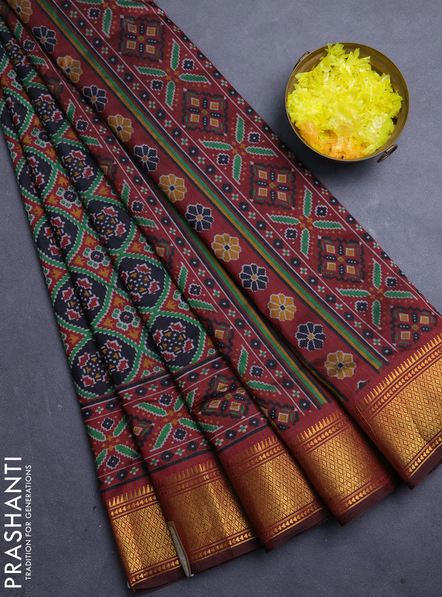 Semi tussar saree black and deep maroon with allover ikat prints and zari woven border