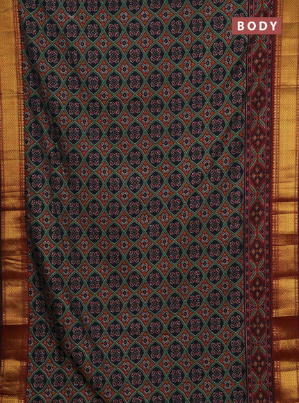Semi tussar saree black and deep maroon with allover ikat prints and zari woven border