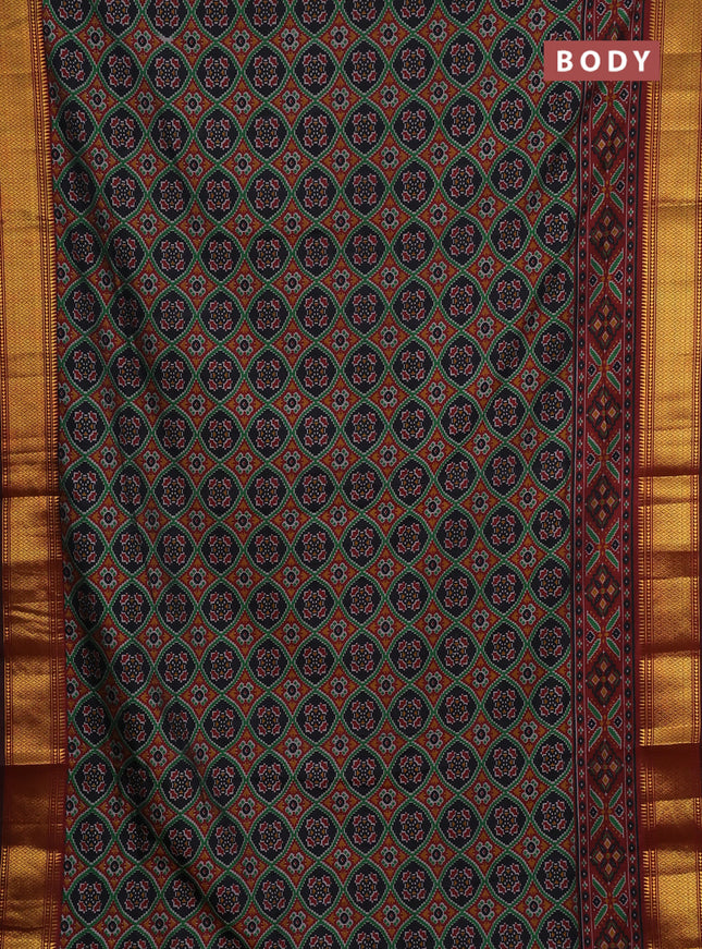 Semi tussar saree black and deep maroon with allover ikat prints and zari woven border