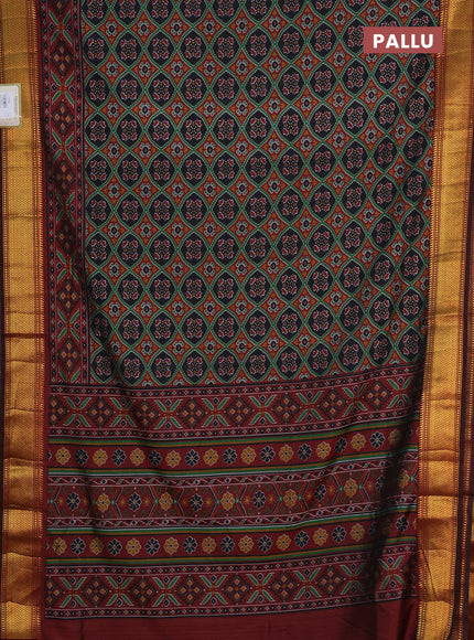 Semi tussar saree black and deep maroon with allover ikat prints and zari woven border