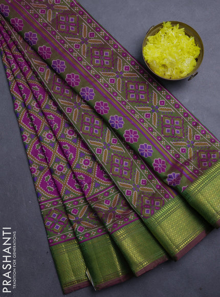 Semi tussar saree dark pink and mehendi green with allover ikat prints and zari woven border