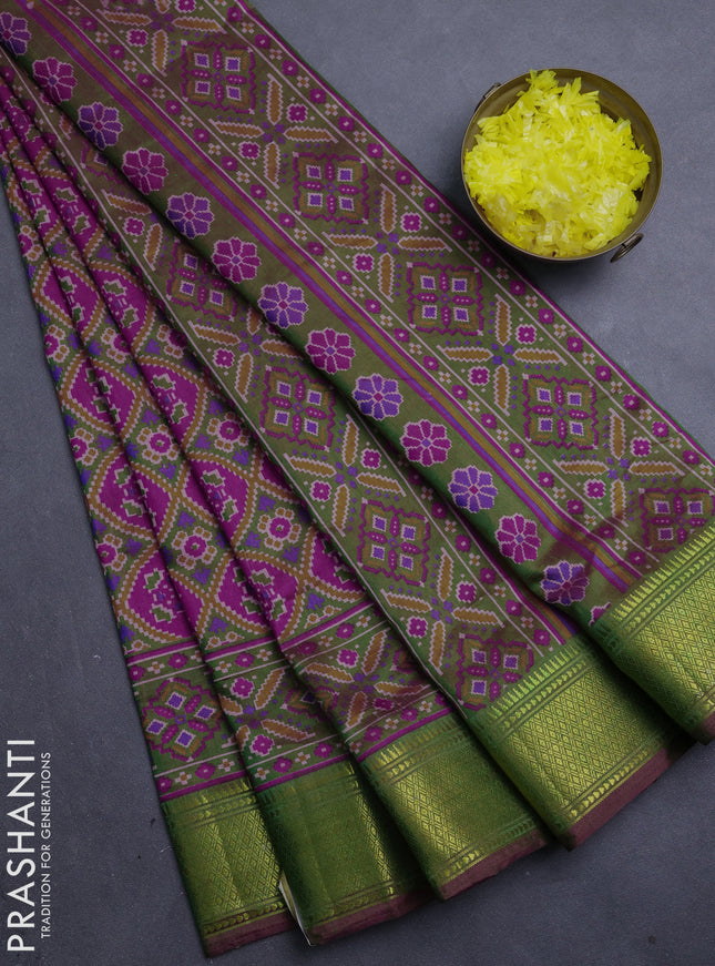 Semi tussar saree dark pink and mehendi green with allover ikat prints and zari woven border