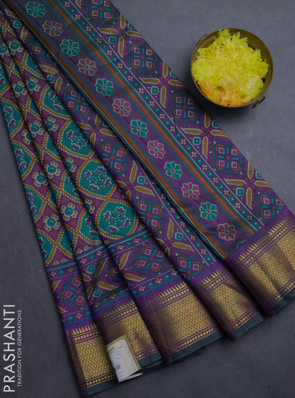 Semi tussar saree teal green and purple with allover ikat prints and zari woven border