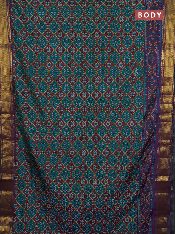 Semi tussar saree teal green and purple with allover ikat prints and zari woven border