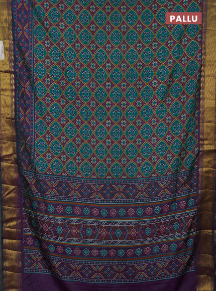 Semi tussar saree teal green and purple with allover ikat prints and zari woven border