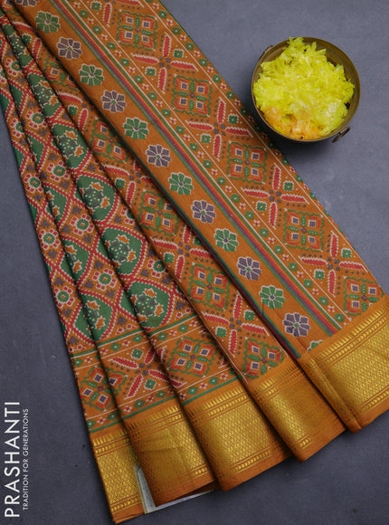 Semi tussar saree green and mustard yellow with allover ikat prints and zari woven border