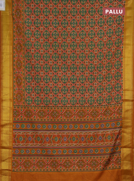 Semi tussar saree green and mustard yellow with allover ikat prints and zari woven border
