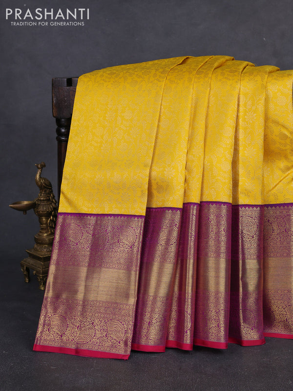 Pure kanchipuram silk saree yellow and purple with allover zari woven brocade weaves and long rich zari woven border