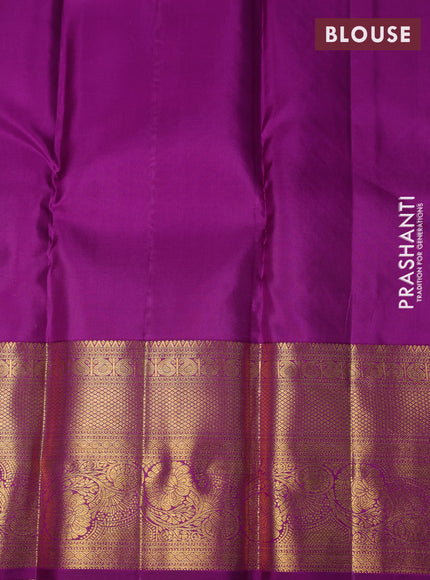 Pure kanchipuram silk saree yellow and purple with allover zari woven brocade weaves and long rich zari woven border