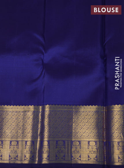 Pure kanchipuram silk saree yellow and navy blue with allover zari woven brocade weaves and rich zari woven border