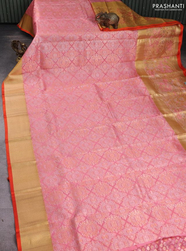 Pure kanchipuram silk saree peach pink and gold with allover zari woven brocade weaves and long tissue floral design border