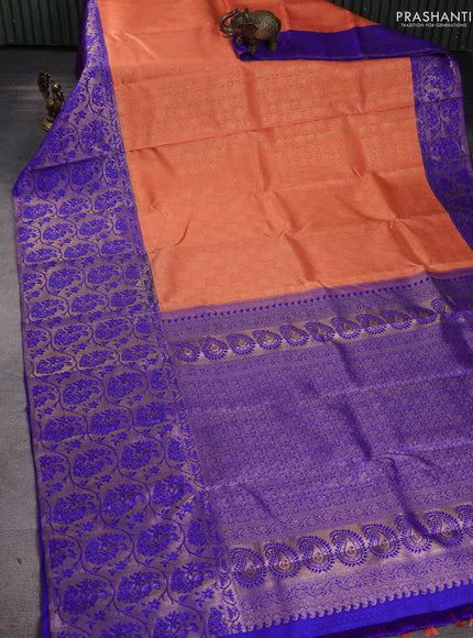 Pure kanchipuram silk saree peach orange and blue with allover zari woven brocade weaves and long zari woven banarasi border