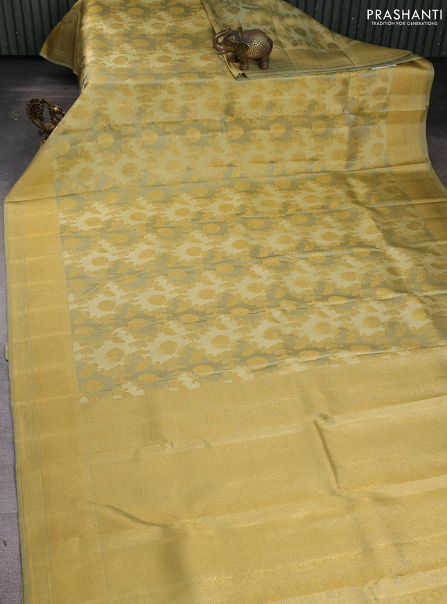 Pure kanchipuram silk saree elaichi green with allover zari woven rangkat weaves and zari woven border
