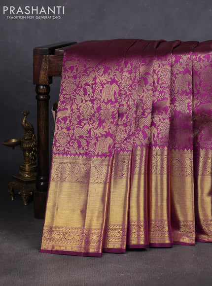 Pure kanchipuram silk saree purple with allover zari woven brocade weaves and long zari woven border