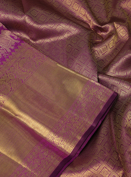 Pure kanchipuram silk saree purple with allover zari woven brocade weaves and long zari woven border