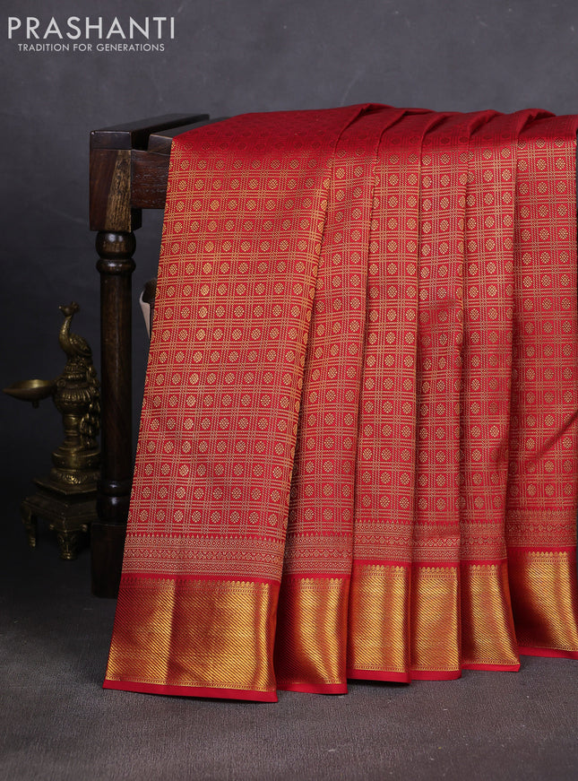 Pure kanchipuram silk saree red with allover small zari checks & buttas and rich zari woven border