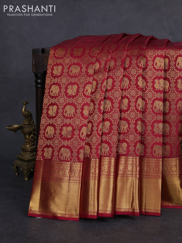 Pure kanchipuram silk saree maroon with allover zari woven brocade weaves and rich zari woven border