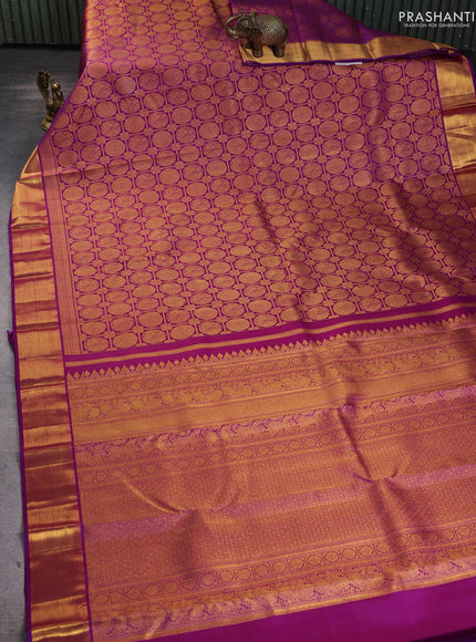 Pure kanchipuram silk saree purple with allover zari woven mayil chakram brocade weaves and rich zari woven border