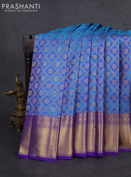 Pure kanchipuram silk saree cs blue and blue with allover zari woven mayil chakram brocade weaves and rich zari woven border