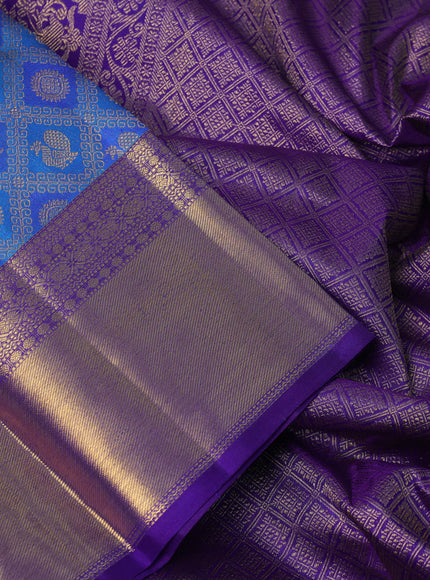 Pure kanchipuram silk saree cs blue and blue with allover zari woven mayil chakram brocade weaves and rich zari woven border
