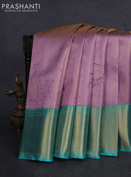 Pure kanchipuram silk saree mild lavender and teal green with allover zari woven brocade weaves and rich zari woven border