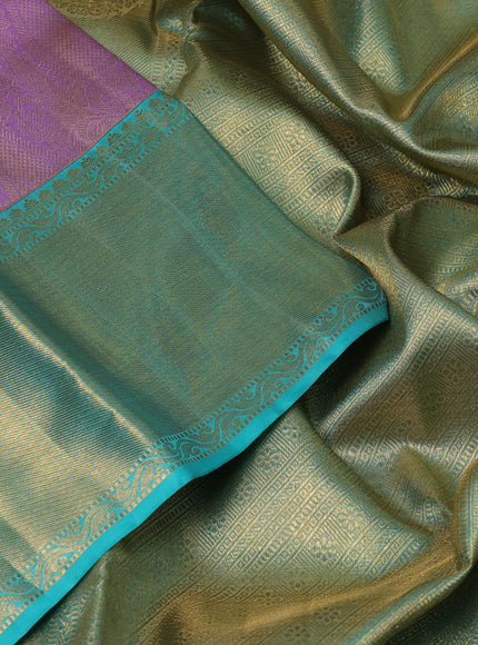 Pure kanchipuram silk saree mild lavender and teal green with allover zari woven brocade weaves and rich zari woven border