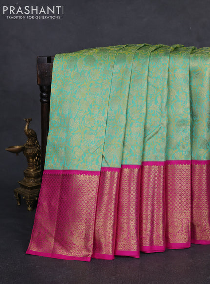 Pure kanchipuram silk saree teal and pink with allover zari woven gandaberunda design and long rich zari woven border