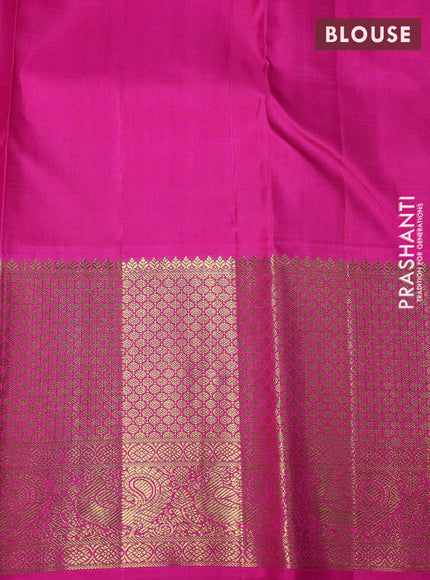 Pure kanchipuram silk saree teal and pink with allover zari woven gandaberunda design and long rich zari woven border