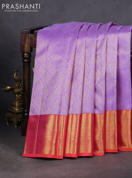 Pure kanchipuram silk saree lavender and dual shade of pinkish orange with allover zari woven brocade weaves and rich zari woven border