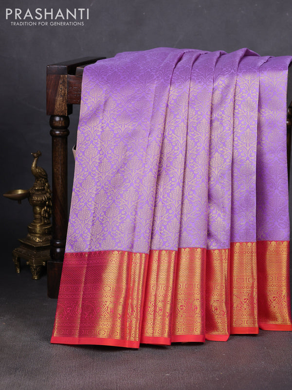 Pure kanchipuram silk saree lavender and dual shade of pinkish orange with allover zari woven brocade weaves and rich zari woven border