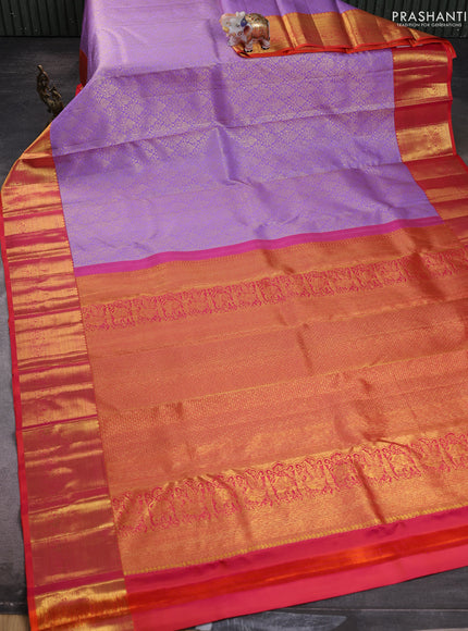 Pure kanchipuram silk saree lavender and dual shade of pinkish orange with allover zari woven brocade weaves and rich zari woven border