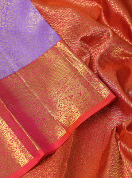 Pure kanchipuram silk saree lavender and dual shade of pinkish orange with allover zari woven brocade weaves and rich zari woven border
