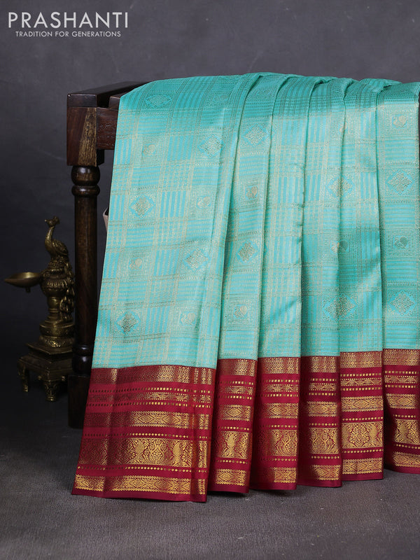 Pure kanchipuram silk saree light blue and maroon with allover zari woven brocade weaves and rich zari woven border