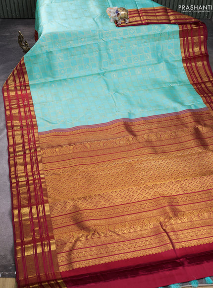 Pure kanchipuram silk saree light blue and maroon with allover zari woven brocade weaves and rich zari woven border