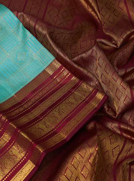 Pure kanchipuram silk saree light blue and maroon with allover zari woven brocade weaves and rich zari woven border