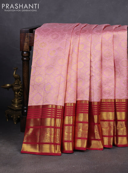 Pure kanchipuram silk saree pastel peach and maroon with allover zari woven brocade weaves and rich zari woven border
