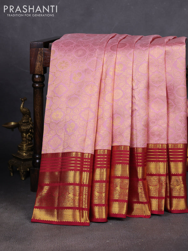 Pure kanchipuram silk saree pastel peach and maroon with allover zari woven brocade weaves and rich zari woven border
