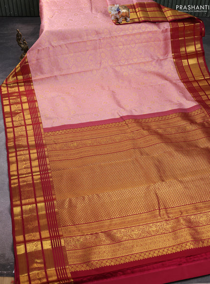 Pure kanchipuram silk saree pastel peach and maroon with allover zari woven brocade weaves and rich zari woven border